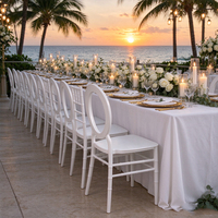 Chaise de mariage ronde en plastique PP blanc, empilable, modèle Phoenix, avec coussin en PU, idéale pour banquets, hôtels, événements et fêtes - Offre Spéciale
