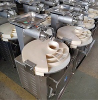 Machine automatique de distribution et de blocage de pâte à diviser et arrondir la pâte