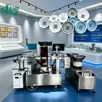 Machine de marquage laser industrielle à double tête avec alimentation automatique par plaque vibrante pour le codage double face des bouchons de bouteilles
