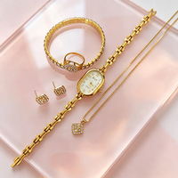 Montre à quartz tendance pour femme avec cadran ovale de 30 mm, bracelet, bague, collier, boucles d'oreilles, ensemble de bijoux en cadeau