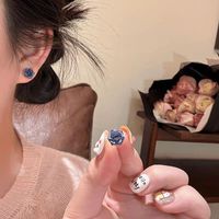 Nouvelles boucles d'oreilles pendantes en forme de rose séchée tie-dye pour femmes, imitation aiguille en argent, bijoux en plastique doux et féeriques, style féminin et cœur de fée