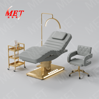Mobilier moderne pour salon de beauté Lit de spa en cuir rose 3 moteurs Lit de massage électrique à base dorée avec tabouret et chariot