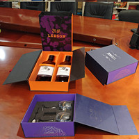 Boîte-cadeau en papier rigide noir de luxe imprimé sur mesure avec couvercle magnétique laminé mat gaufré pour l'emballage du vin, y compris la mousse Eva