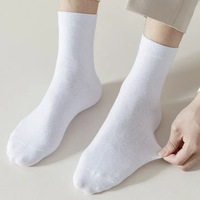 Vente en gros de chaussettes de haute qualité pour hommes en coton tricoté unisexe avec des impressions de logo personnalisé chaussettes souples