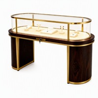 Gebogene Schmuck-Vitrine Glas-Schaukasten Theke LED-Beleuchtung Modernes Holz Gold für Boutique Einkaufszentrum Ausstellungsraum Ladeneinrichtung