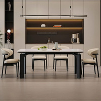 Table à manger en dalle moderne minimaliste italienne pour un usage domestique, petits espaces, avec pieds en acier au carbone + plateau en granit