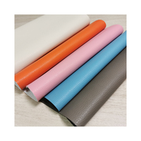 Tissu en cuir PU gaufré litchi couleur unie pastel clair avec support tissé résistant à l'abrasion pour sièges de voiture, canapés et sacs - 0,7-0,8 mm