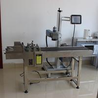 Machine de codage par lots laser à fibre économique imprimante à jet d'encre laser 20W pour le codage du numéro de lot de code à barres de date d'expiration