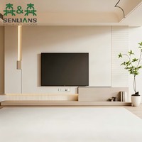 Mur média de luxe discret avec panneaux muraux flottants, bandes LED décoratives et banc de rangement bas pour maison moderne