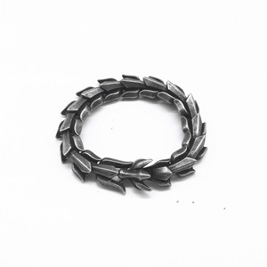 Yunnique Elegante Brazalete de Acero de Titanio Negro con Diseño Geométrico de Planta, Joyería Unisex, Brazalete de Acero Inoxidable 316 - Product Image 1