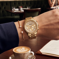 Montre chronographe de luxe pour femmes MKOriginals en acier inoxydable doré, avec lunette pavée de cristaux, aiguilles, étanche, fermoir pliant