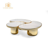 Ensemble de canapés de salon au design moderne de luxe nordique Table basse trois pièces irrégulière avec matériau en métal