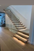 Escalier flottant droit à balustrade invisible avec éclairage LED, en acier et bois, pour loft