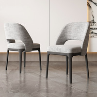 Chaise de salle à manger rembourrée de style nordique moderne, assise en tissu avec pieds en bois noir, design élégant ajouré pour la maison, le restaurant, le café, l'hôtel