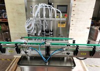 Machine de remplissage et de scellage à 6 têtes pour liquides (eau pure, huile d'olive, savon liquide pour les mains, miel) avec pompe magnétique à rotor en plastique, Dubaï
