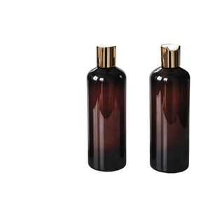 Botella Redonda de PET Transparente Ámbar de 400 ml Personalizada para Gel de Ducha, Champú, Loción, Acondicionador para el Cabello, Envase para Jabón Corporal - Product Image 1