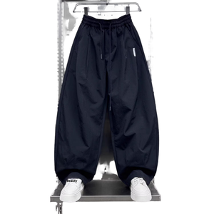 กางเกงลำลองของผู้ชายมีแบรนด์แฟชั่นขากว้างยางยืดสีทึบด้านหน้าเรียบน้ำหนักเบาปานกลางผ้าเนื้อละเอียดสำหรับฤดูใบไม้ผลิ/ฤดูร้อน - Product Image 1