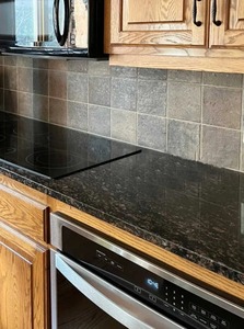 <b>Tan</b> Black Granite – Premium Black Granite Slabs for Modern Architecture & Luxury Spaces - Product Image 1