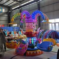 Manège à chaises volantes rotatives sur le thème des clowns en fibre de verre pour enfants, destiné aux parcs d'attractions et centres commerciaux
