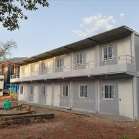 Maison conteneur modulaire préfabriquée respirante à deux étages de 20 pieds en panneaux sandwich d'acier rectangulaires, hôtel-villa moderne pré-construit