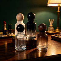 Prix d'usine, logo personnalisable, flacons de parfum en verre cylindriques de 50 ml et 100 ml