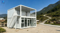 Villa préfabriquée à deux étages en panneaux sandwichs plats intégrés, grandes fenêtres en verre, balcon, design moderne pour usage bureautique ou résidentiel