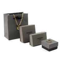 Petite boîte d'emballage de bijoux en carton gris personnalisée pour la Saint-Valentin Ensemble de boucles d'oreilles et colliers de style occidental Éponge personnalisée