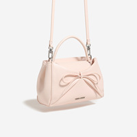 Nouveau sac à main uni avec nœud mignon pour jeunes filles, style simple et tendance, sac fourre-tout polyvalent pour le quotidien
