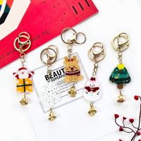 Porte-clés en acrylique en forme de cloche de Noël |   Breloque de sac unisexe élégante et festive |   Vente en gros de cadeaux de Noël
