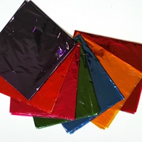 Vente en gros de papier cellophane coloré Film Opp 21g-30gsm Papier d'emballage cellophane transparent pour l'emballage