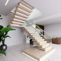 Kit d'escalier flottant en marbre veiné noir et blanc avec éclairage LED sur les marches