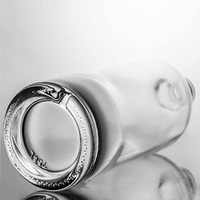 Vente directe d'usine de qualité supérieure, bouteille de liqueur à col court et base épaisse de 700 ml et 750 ml, forme ronde, bouteille de whisky en verre avec bouchon en liège