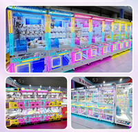 Nouvelle conception de mini machine à griffes à prix bas, à pièces, pour peluches anglaises en fer et métal, pour jeux d'arcade et distributeurs automatiques de jouets