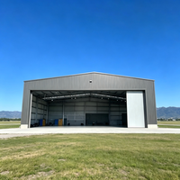 Hangar industriel préfabriqué en acier sans colonnes, moderne, pour avions et jets privés, avec une durabilité de 20 ans