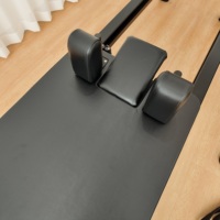 Vente en gros de Reformers de Pilates professionnels en aluminium noir, légers, durables, réglables et très demandés