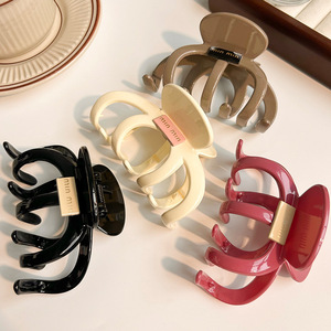 Nuovi artigli per capelli acrilici di moda coreana di tendenza fermagli per capelli Color caramella brillante accessori per capelli con artigli di coda di cavallo
