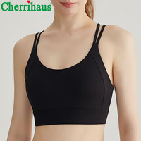 Soutien-gorge de sport haute performance résistant aux chocs pour femme, avec rembourrage fixe, fines bretelles croisées au dos, idéal pour l'entraînement, le fitness et le yoga