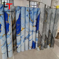 Mármol metálico Película de PVC dorado Película de decoración de transferencia de calor Rollo de estampado en caliente para fabricante de láminas de prensa al vacío Laminación dorada