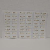 Etiquetas de Papel Texturizado con Logotipo Personalizado, 120gsm, Cuadradas, con Estampado Dorado Mate, al Mejor Precio de Fábrica y Alta Calidad