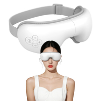 Masseur oculaire électrique 2026 avec musique et chauffage au graphène, batterie 1200 mAh, prise USB Type-C pour une expérience de relaxation visible
