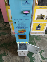 Fabricant de machines à monnayeur, système d'échange automatique de pièces de monnaie pour salles d'arcade et parcs d'attractions