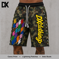 Shorts personnalisés camouflage woodland multicolore avec patch éclair et clous latéraux, en coton épais 300 g/m², ourlet brut et cordon de serrage, pour fabricants de marques