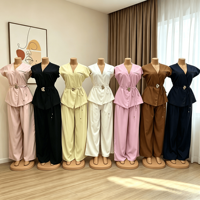 Ensemble élégant deux pièces pour femme, vente en gros d'usine, décontracté d'été, sans manches, avec ceinture, gilet et pantalon large, couleur unie, idéal pour le bureau