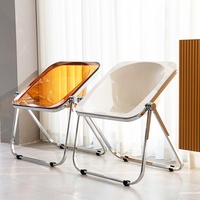 Chaise de salle à manger pliable moderne minimaliste en plastique avec dossier transparent et pieds en métal