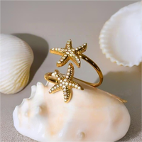 Bague ouverte en acier inoxydable plaqué or 18 carats à la mode pour femmes Searing 5A White Zircon Starfish pour mariage ou cadeau