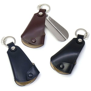 Calzador de acero inoxidable con mango de 10 cm de largo, elevador de zapatos metálico para personas mayores y mujeres embarazadas, con funda protectora de cuero. - Product Image 1