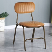 Tabouret de bar industriel vintage en métal style américain avec assise en cuir rembourrée pour mobilier de loft