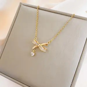 Bijoux fantaisie pour femmes zircon cubique alliage de cuivre nœud plaqué or pendentif collier adapté à l'usage quotidien des femmes