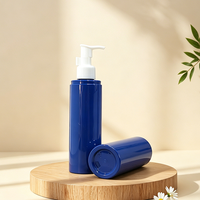 Botol Pompa Silinder PET Tinggi Ramping 180ml Custom, Dispenser Kosmetik Biru Tua Mengkilap dengan Pompa Lotion Putih