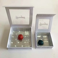 Boîte cadeau en papier pour chocolats haut de gamme à 4/9 cavités, avec couvercle à fenêtre transparente et insert en plastique PET